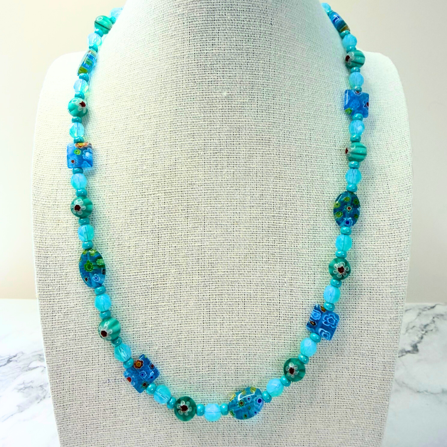 Millefiori Flower Necklace – Lagoon, Colorful Glass Jewelry in Aqua Blue Floral Design, Stainless Steel