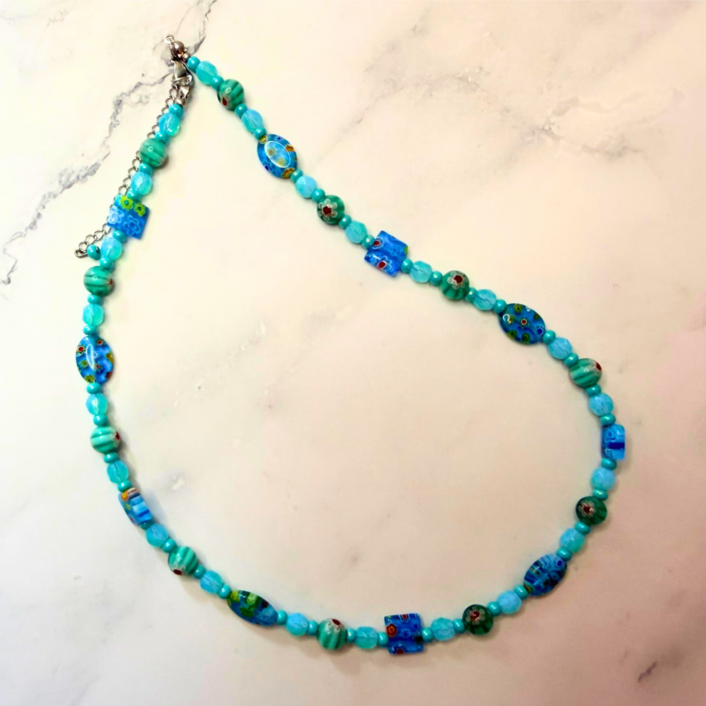 Millefiori Flower Necklace – Lagoon, Colorful Glass Jewelry in Aqua Blue Floral Design, Stainless Steel